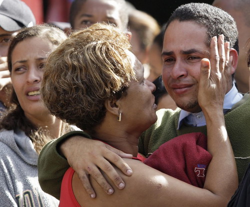 At least 200 buried, feared dead in Rio mudslide