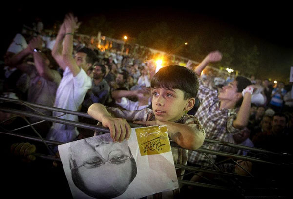 Supporters of Iran presidential candidate gather