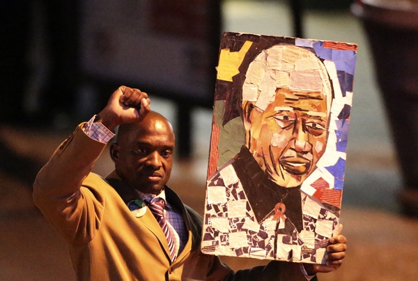 People pay respect to Mandela