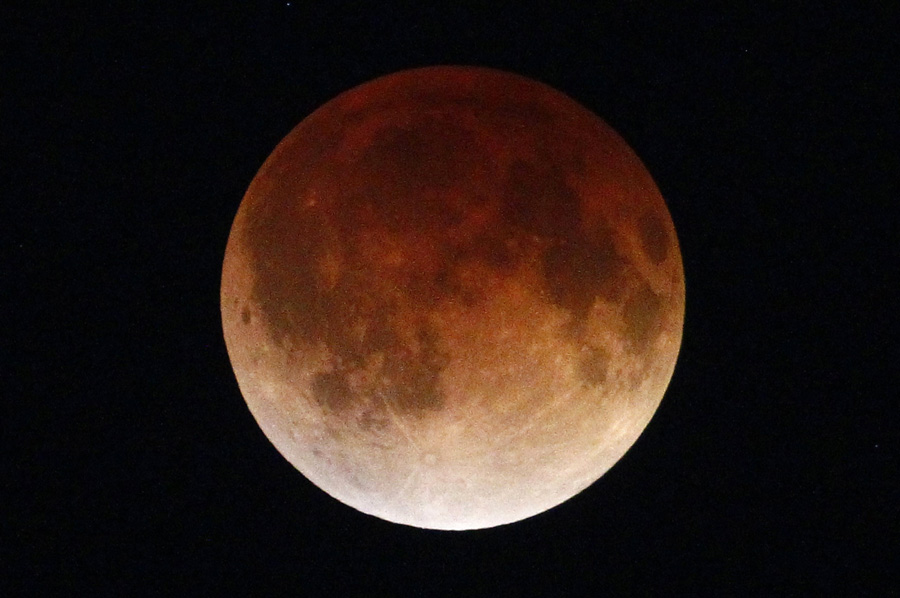 Sky-watchers see 'blood moon' in total lunar eclipse