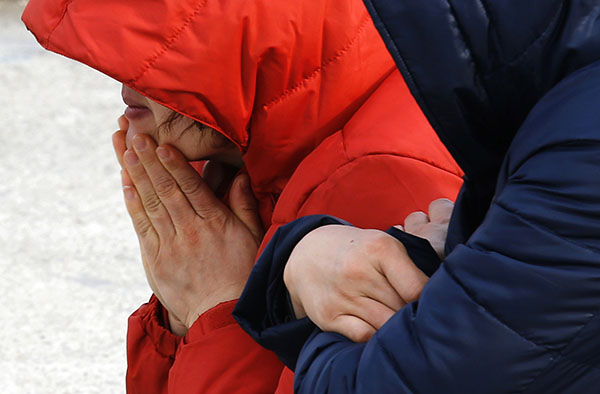 Chinese mother mourns dead son, S. Korean president calls ferry disaster 'murder'