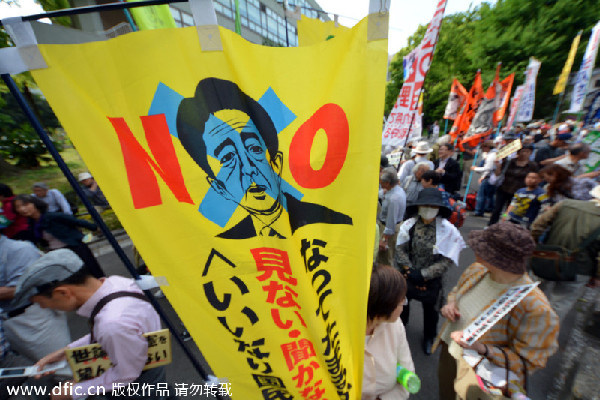 Japan split over revision to pacifist constitution