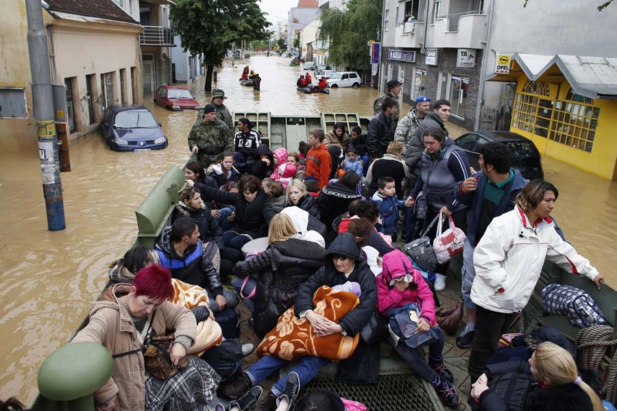 Bodies pulled from submerged homes in Balkans flooding