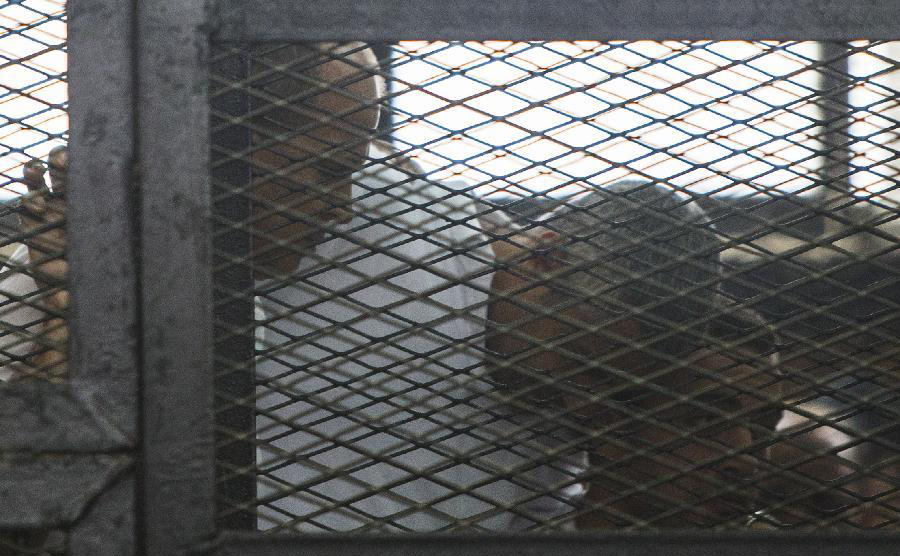 Egypt sentences three Jazeera journalists to 7 yrs