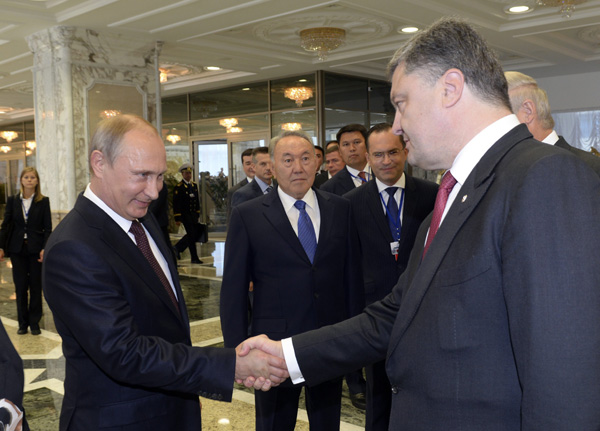 Putin, Poroshenko hold first bilateral meeting