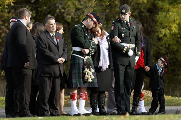 Crowds gather for funeral of Canadian soldier killed in Ottawa