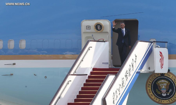 Obama arrives in Beijing for APEC meeting, state visit