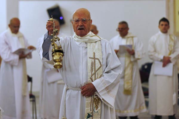 Baghdad's Christians gather defiantly for Christmas Eve mass