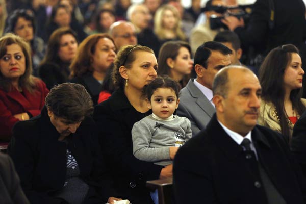 Baghdad's Christians gather defiantly for Christmas Eve mass