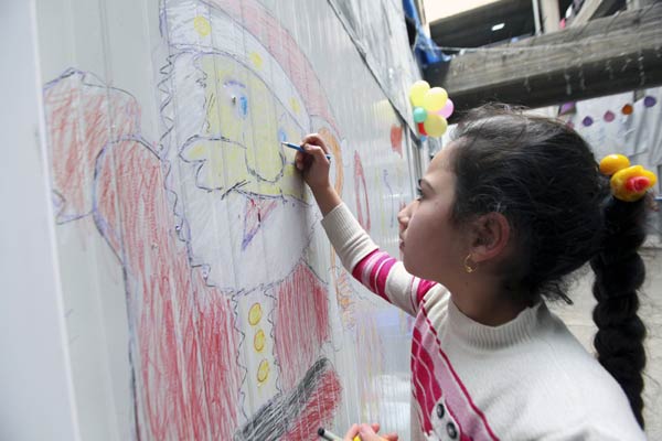 Baghdad's Christians gather defiantly for Christmas Eve mass