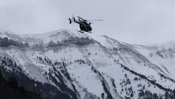 France cracks open plane's black box, seals off crash site