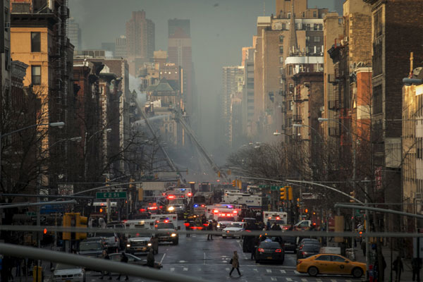 New York fire, building collapse injure 12