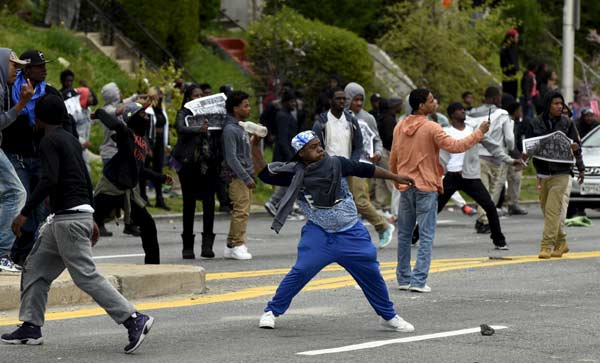 Riot, looting prompt state of emergency, curfew in Baltimore