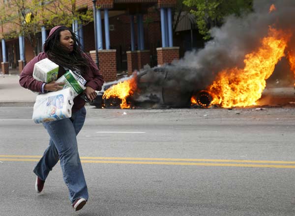 Riot, looting prompt state of emergency, curfew in Baltimore