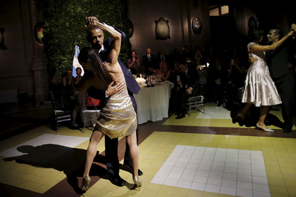 Obama dances tango during a state dinner in Argentina