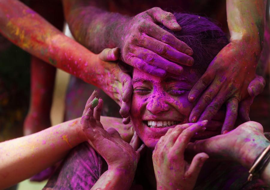 Dancing in bright colors of Holi