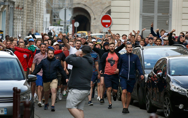 French riot police arrest 323 soccer fans on violence charges