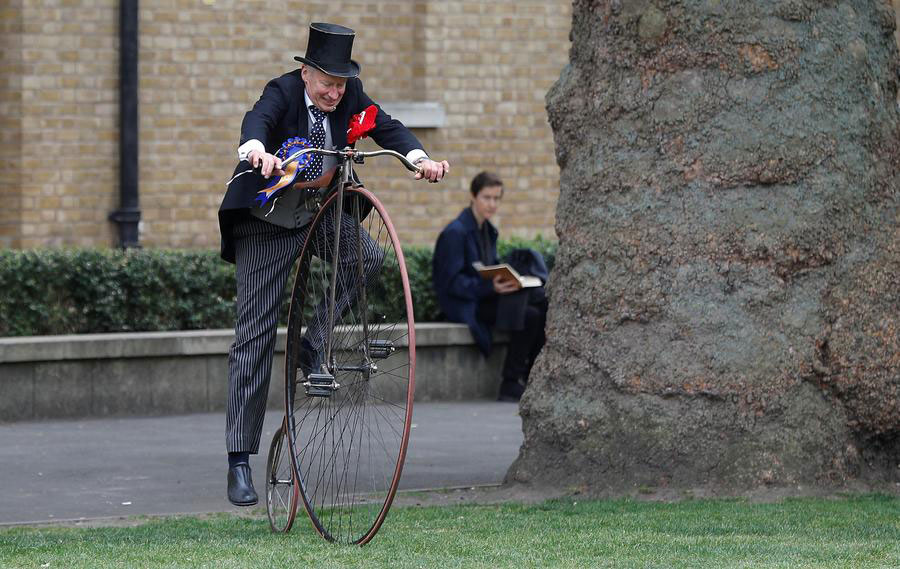 Hundreds of cyclists ride through The Tweed Run in London