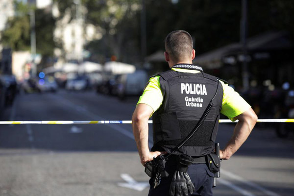 Barcelona in lockdown as police search for terrorists