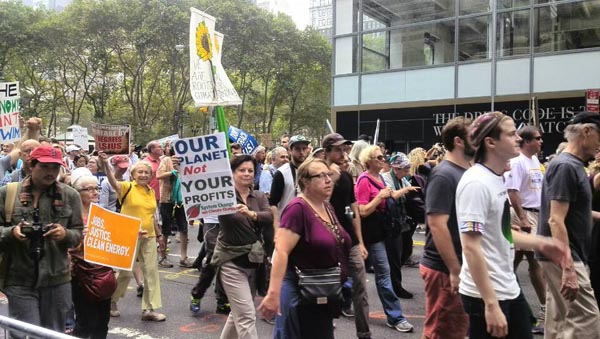 Tens of thousands crowd New York streets for climate march