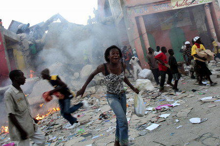 Haitian capital sees riots for goods