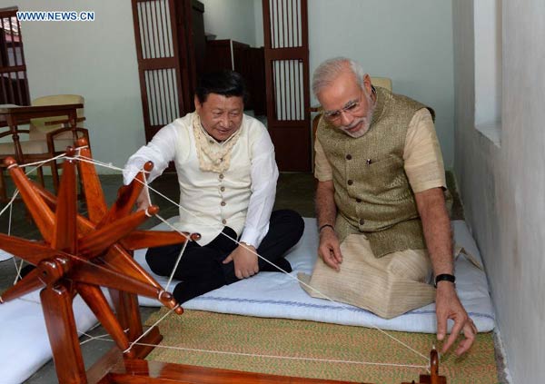 Xi visits Modi's home state, extends birthday wishes