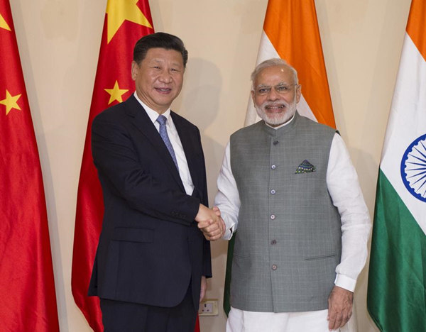 Xi: Keep working with India on railways, business parks